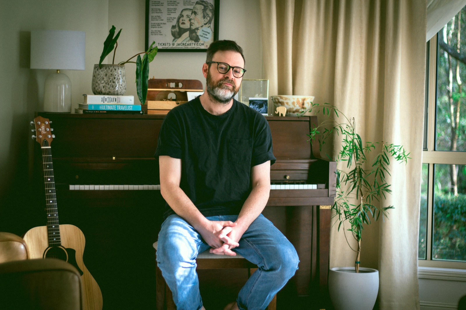 Jack Carty — press photo, black t-shirt, piano